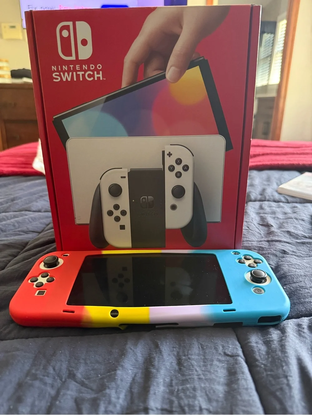 Nintendo Switch OLED Rainbow Joy-Con Bundle with White Dock and Accessories